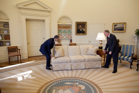 Not putting his back into it! Lifting with his legs. (White House Photographer Pete Souza)