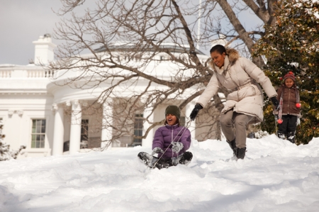They have plastic sleds just like us! (White House Photographer Pete Souza)