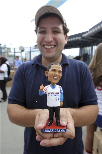 "I've got the whole Obama in my hands" (AP Photo/Mary Altaffer)