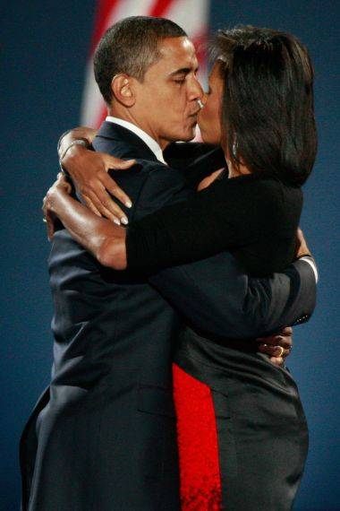 Their first kiss as the newly elected First Couple (Scott Olson/Getty Images)